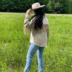 Brand new, light, fringe back/sleeve jacket